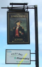 Photo 6x4 Sign for the John Paul Jones on Moor Road (A165) Hunmanby Moor  c2016