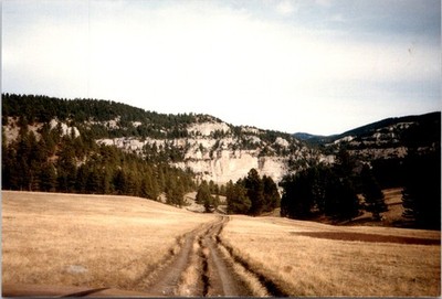 View mountain cliffs coming down mtn 80'sDeep Creek Ranch, MT Found Photo V3498