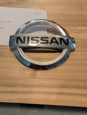 2005-2015 Nissan Pathfinder Titan Rear Emblem Oem New Genuine 90891-ea500