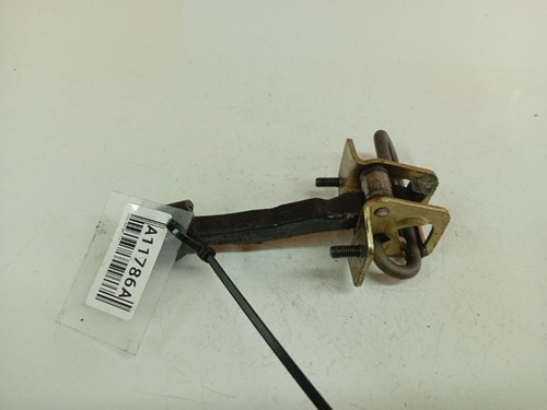 Door check strap stopper