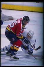 Center Jesse Belanger Florida Panthers looks on at a game v the Qu- Old Photo