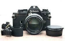  NEAR MINT Nikon EM 35mm SLR Film Camera w/ Ai-S 50mm f1.4 Lens Works Japan