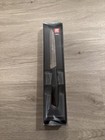 J.A. Henckels International Silver Cap Serrated Edge Santoku Knife 13570-130(5") — photo 2