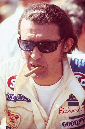 Richard Petty of STP Petty Enterprises smokes a cigar by paddo- 1972 Old Photo 1