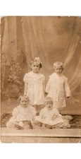 1900s Studio Portrait 4 Children Postcard Puffed Sleeves Christening Gowns