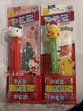 2025 Two  Christmas Pez: Happy Holidays Pikachu & Hello Kitty With Green Bow