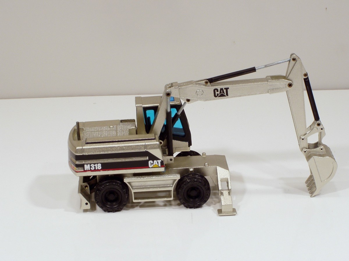 CATERPILLAR M 318 C BAGGER TIEFLÖFFEL WEISS #516.2 NZG 1:50 OVP