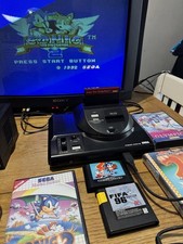 Sega Megadrive (Mega Drive) Console with Master System Converter & Games
