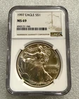 1997 SILVER EAGLE NGC MS 69 ~~ BROWN LABEL  ~~ GOLDEN TONED BEAUTY