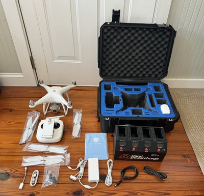 Brand New Phantom 4 Pro V2. Open Box Bundle  With GCP Case And Multi Charger.
