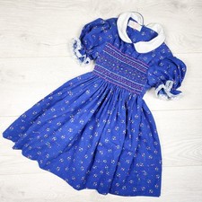 Vintage late 60s / early 70s handmade floral calico print smocked dress. Size 5T