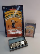 VINTAGE HOHNER POCKET PAL HARP 10 HOLE HARMONICA WITH LEARNING BOOK AND TAPE.
