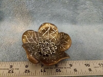Brass or metal flower blossom, decor or topper of some sort