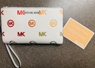 michael kors jetset rainbow logo embossed wristlet — photo 7