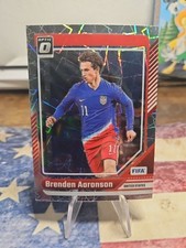 Brenden Aaronson 2024-25 Panini Donruss Optic Velocity Prizm USMNT #11
