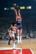 Dan Issel Denver Nuggets shoots over Wes Unseld Washington Bullets- Old Photo