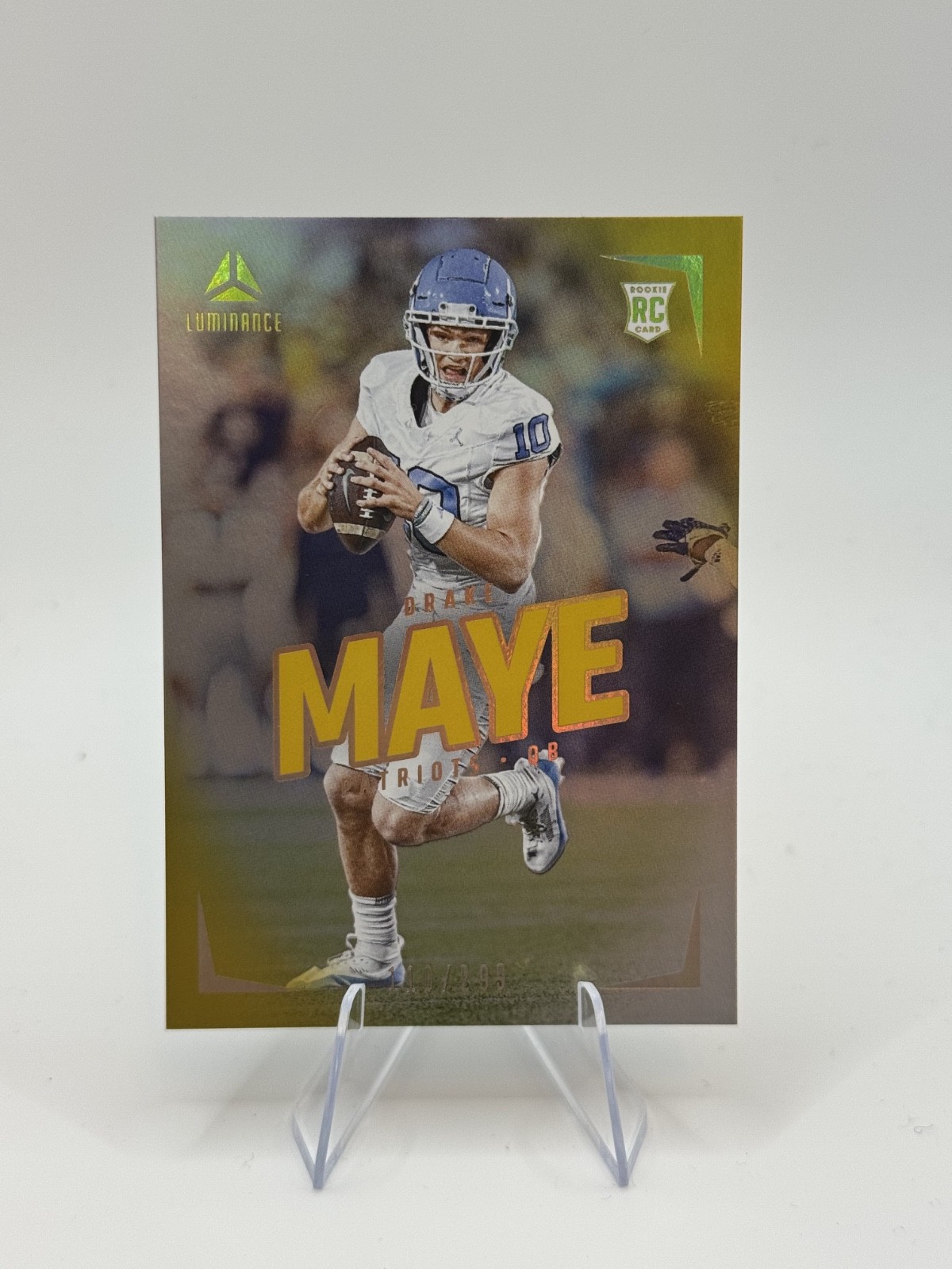 Drake Maye 2024 Panini Luminance Rookies Gold SN /299 #103 Rookie RC