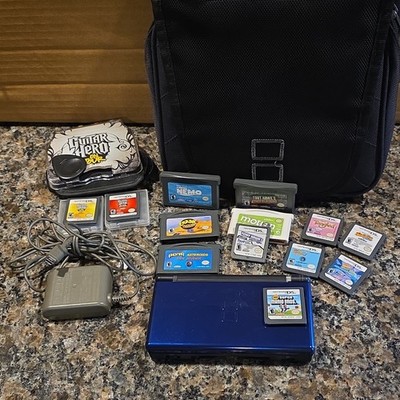 Nintendo DS Lite Bundle w/ Charger, Case, 12 Games & Guitar Hero Grip
