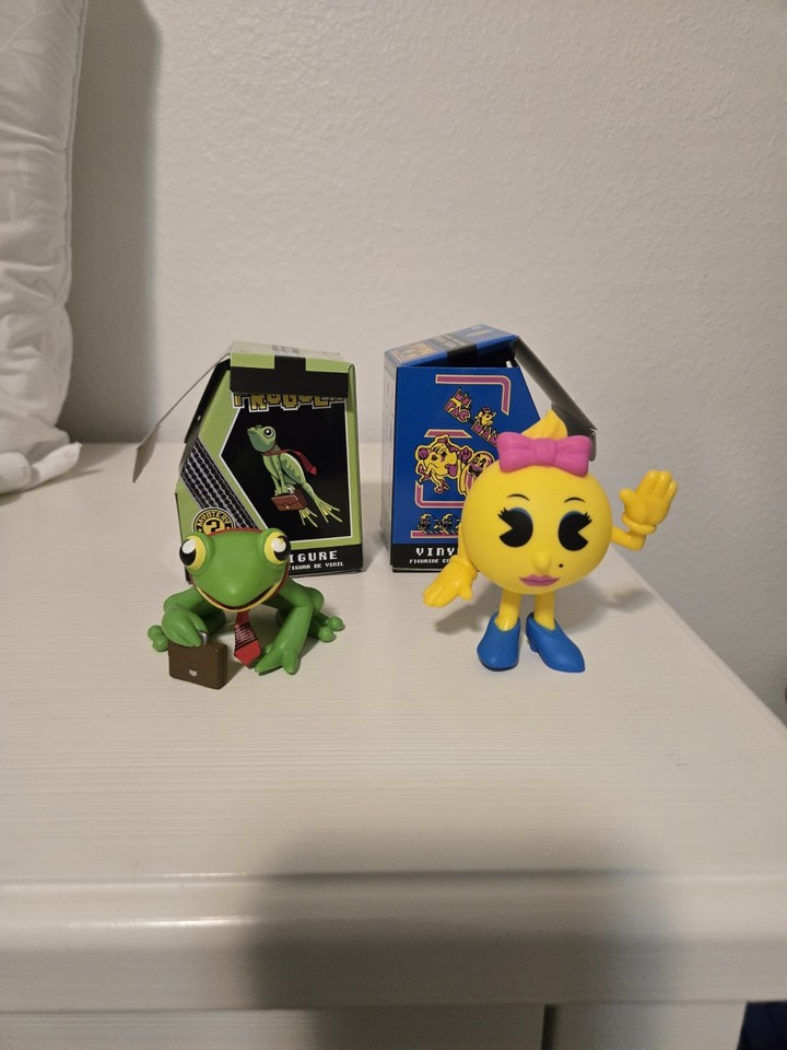 Blind-box mystery mini figures themed around retro arcade culture — the surprise factor makes it addictive.