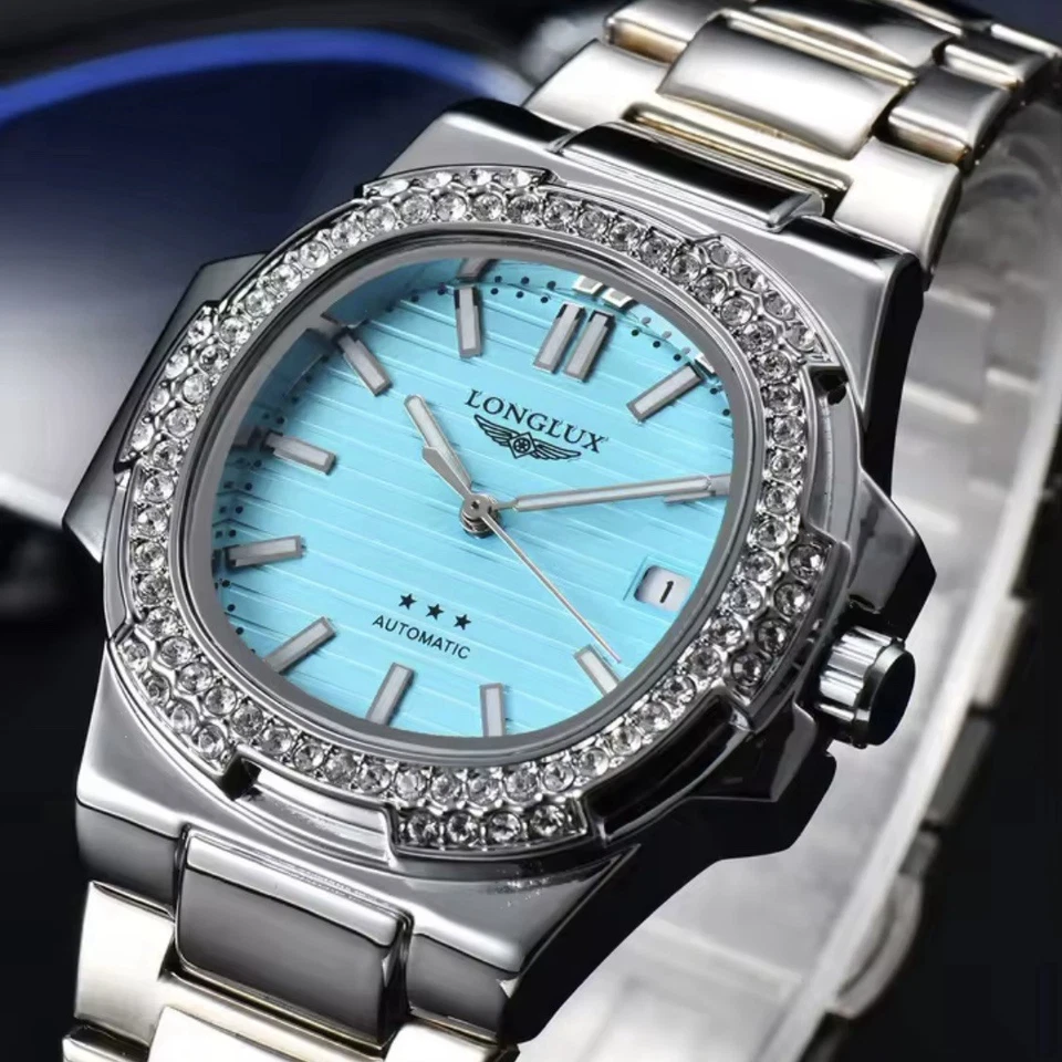 Reloj automático de lujo plateado con esfera turquesa y bisel de diamantes para hombre Foto 2 de 4