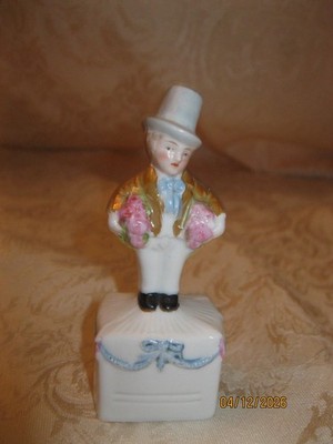 HALF DOLL RELATED TAPE MEASURE/THIMBLE HOLDER BOY W/ ROSES - 4'' TALL - GERMANY