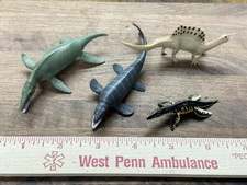 4 small scale aquatic Collecta like dinosaur models