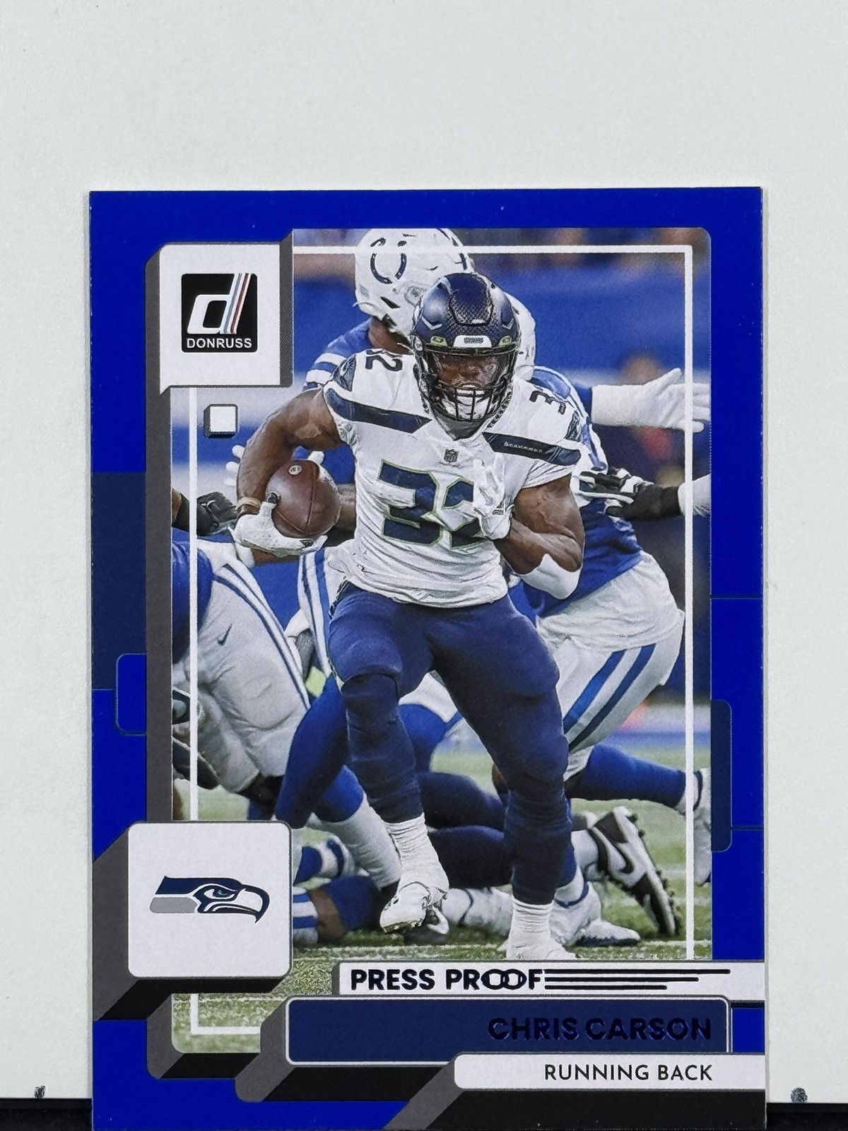 2022 Panini Donruss #33 Chris Carson Blue Press Proof