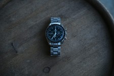Omega Speedmaster  311.30.42.30.01.005 with box, papers, hangtag, and extra link