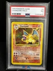 1999 POKEMON BASE SET UNLIMITED #4 CHARIZARD-HOLO PSA 7