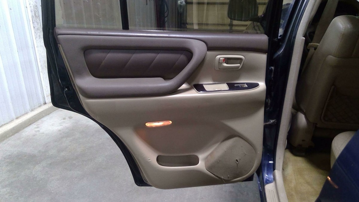 98-02 Toyota Land Cruiser Rear Left Door Trim Panel (OEM Ivory