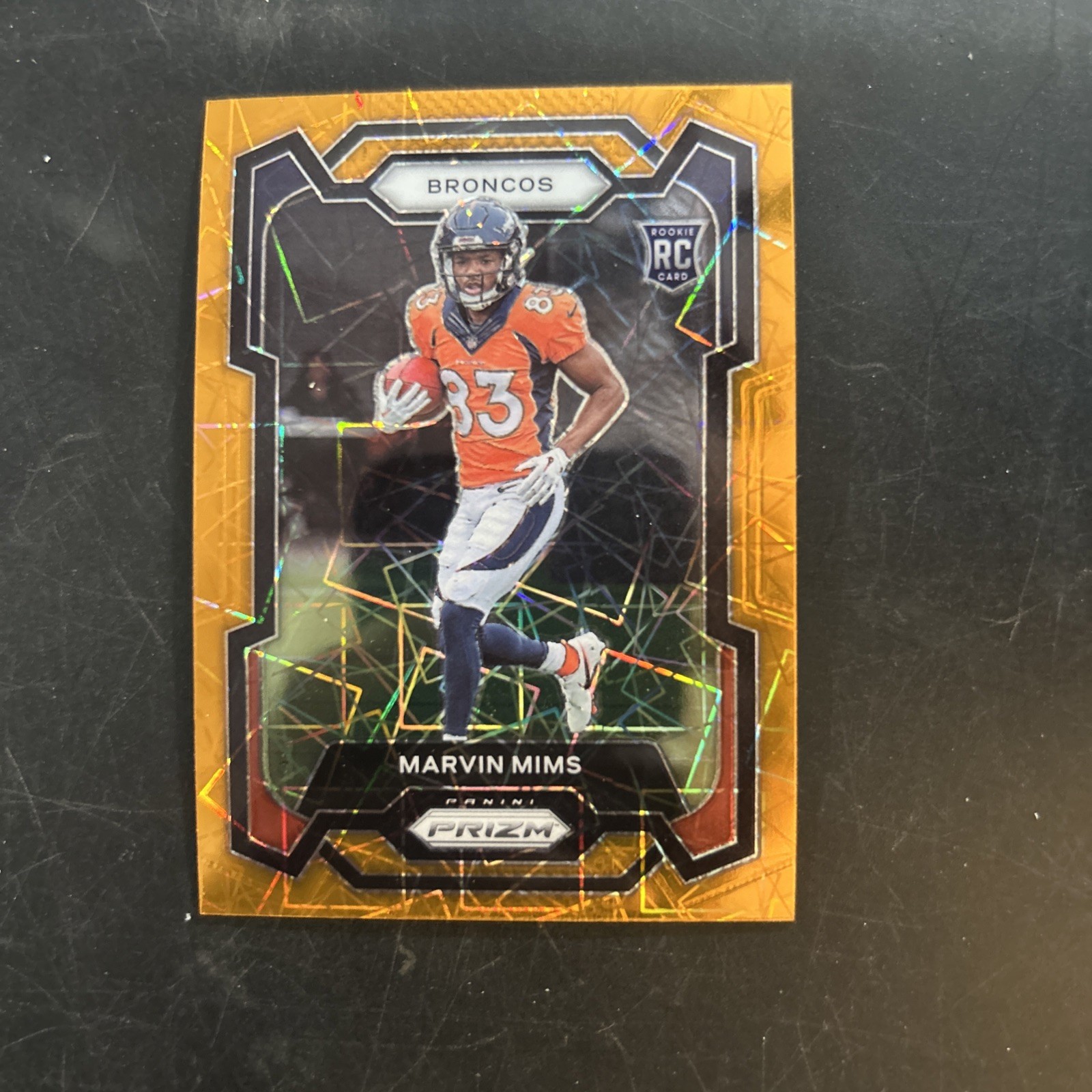 2023 Panini Prizm - Marvin Mims Orange Laser (RC) #327 | Denver Broncos