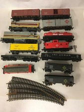 Lot of 13 Vintage Erie Lackawana Toy Trains Logger Engine Cabooses and More