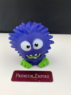 green monster dog toy