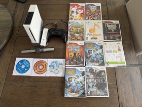 Mixed video game lot including Sony and Nintendo consoles and games