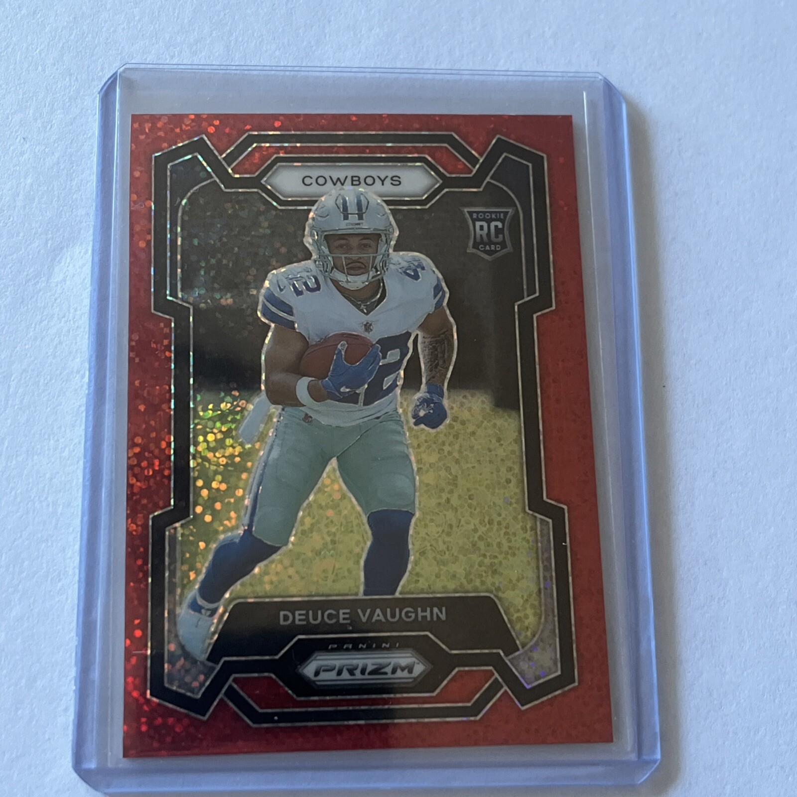 2023 Panini Prizm - Rookies Red Sparkle Prizm #324 Deuce Vaughn (RC)