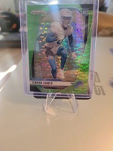 2024 Panini Prizm - Rookies Terrion Arnold #389 Neon Green Pulsar Prizm (RC)
