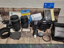 Minolta Maxim 7000i Camera Body With sport Card 2 lenses, flash, filters, etc.