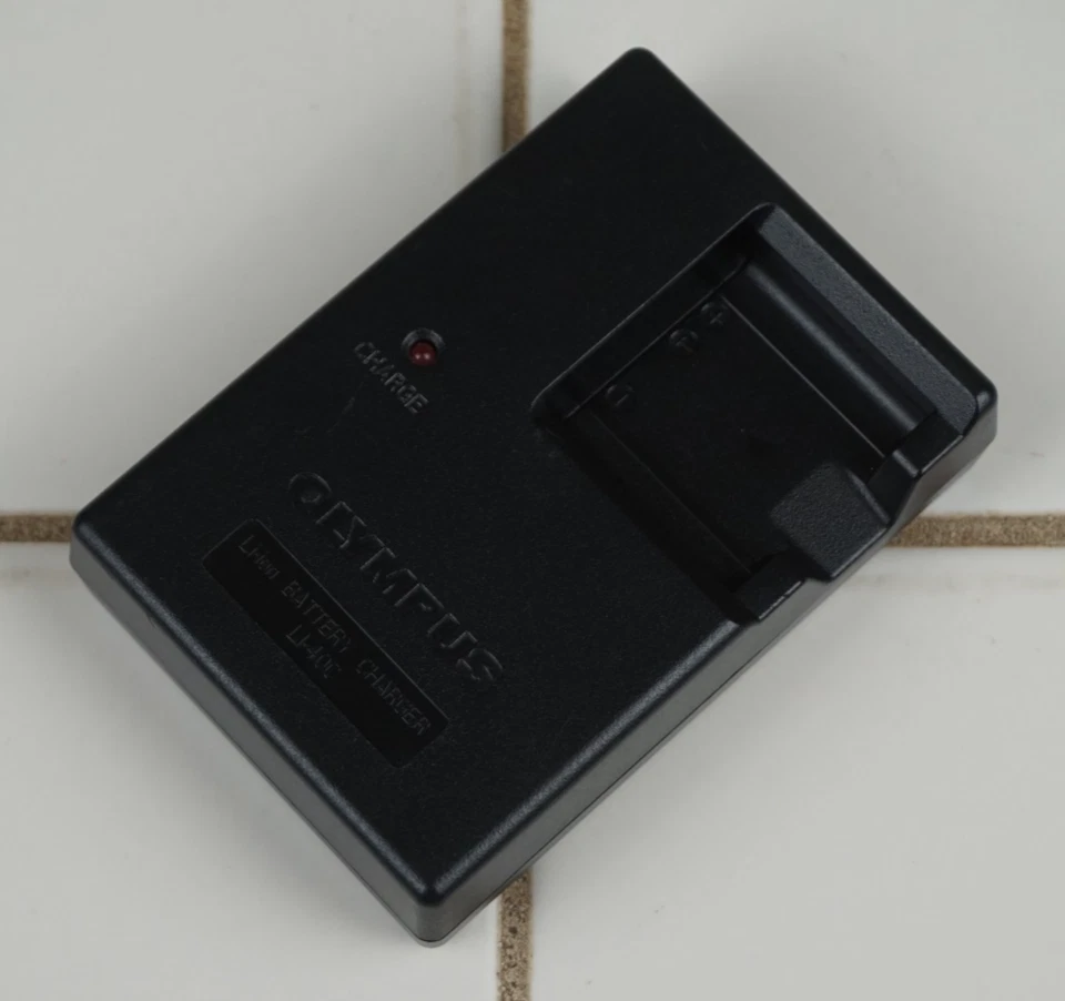 Cargador de batería genuino para cámara Olympus LI-40C y batería de iones de litio LI-42B probado envío gratuito Foto 2 de 4