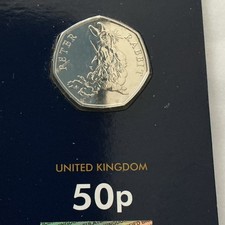 2019 PETER RABBIT EATING CARROTS. LOW MINTAGE. SLIGHT TARNISH.