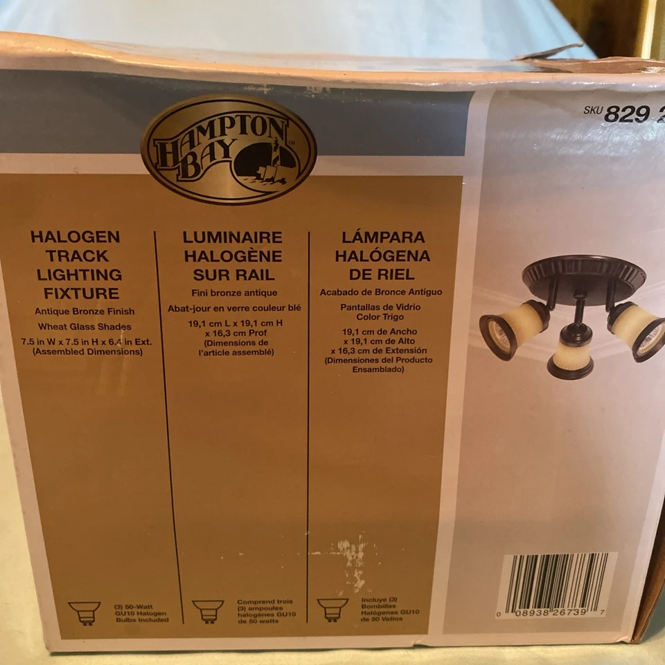 Lámpara de iluminación halógena de pista Hampton Bay. Cualquier acabado bronce, pantalla de vidrio de trigo Foto 3 de 4
