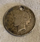1927 peace silver dollar-holed