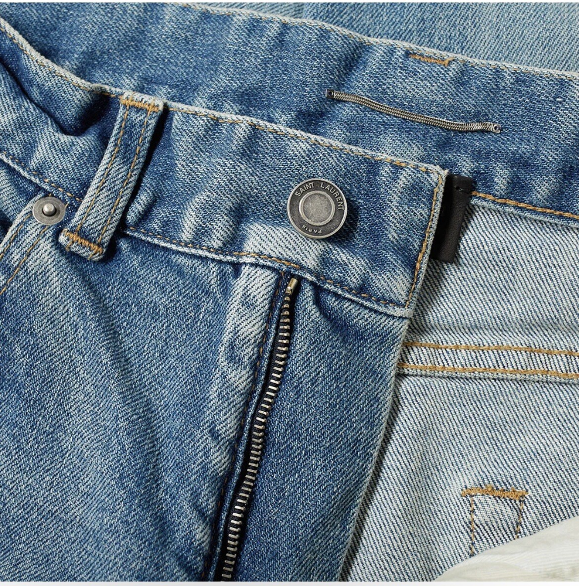 Jeans skinny SAINT LAURENT in denim blu elasticizzato con ginocchia distrutte taglia 33