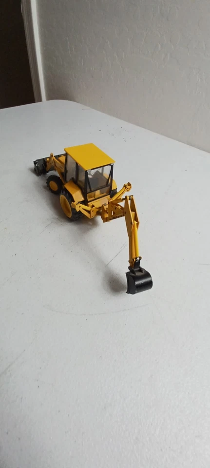CONRAD Excavator with Backhoe 1:35 scale - Made In Germany MF 50HX - Image 3 of 4