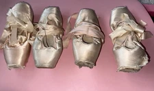 used single pair of pointe shoes worn by professional ballerina