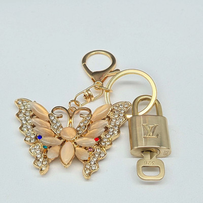 Louis Vuitton Authentic Gold Padlock Key +Stylish Unbranded Butterfly Bag Charm