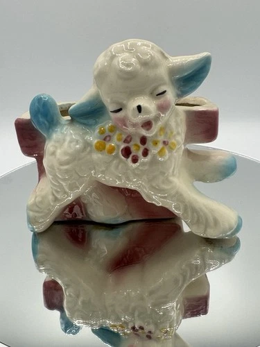 Vintage Shawnee ceramic lamb figurine planter dates from the 1950s