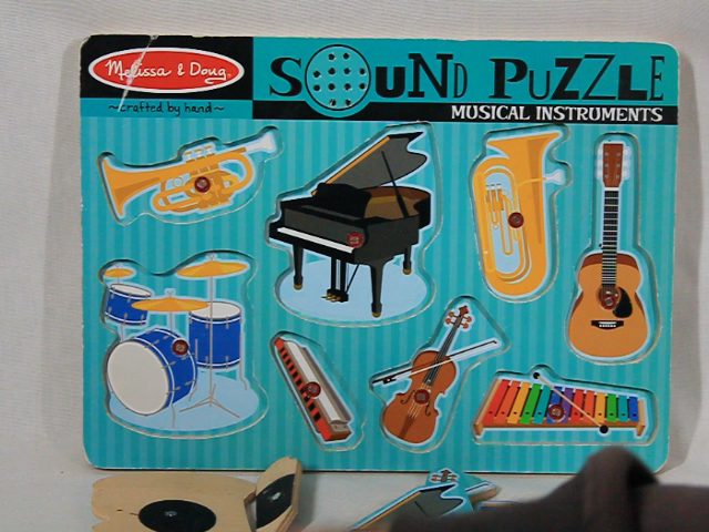 MELISSA & DOUG 8 MUSICAL INSTRUMENT PIECES WITH WOODEN PEGS SOUND