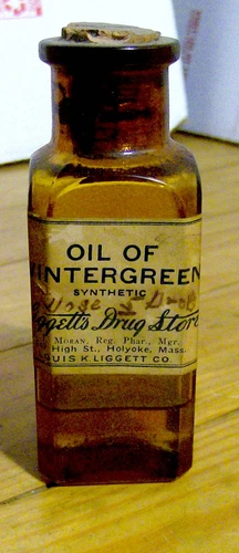 antique 1890s WINTERGREEN OIL glass flavor bottle Liggett MORAN DRUGGIST HOLYOKE