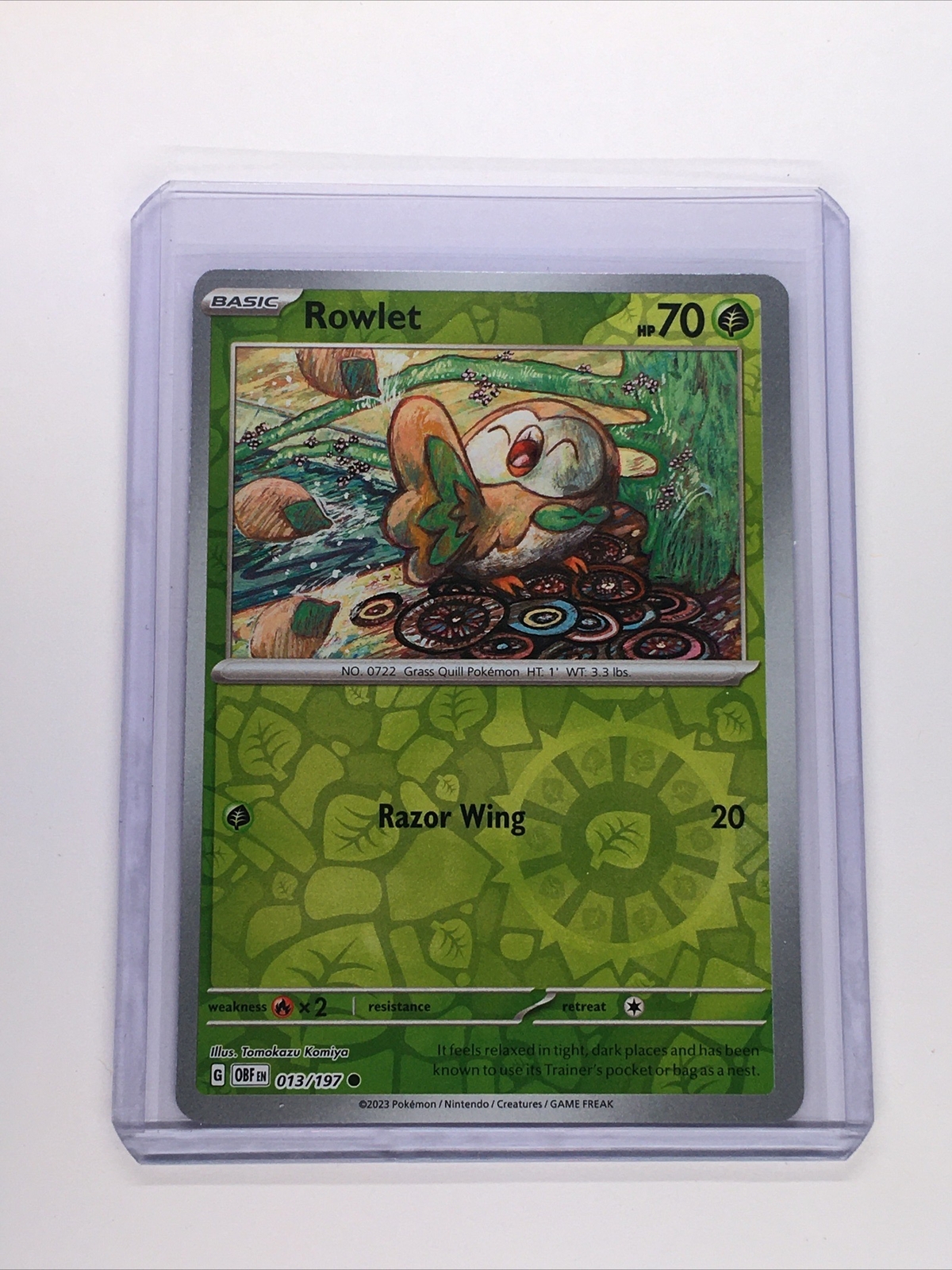 Rowlet 13/197 Reverse Holo NM Scarlet & Violet (Obsidian Flames) Pokemon Card