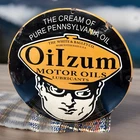 VINTAGE 12” DOMED OILZUM MOTOR OILS LUBRICANTS WHITE BAGLEY PORCELAIN SIGN